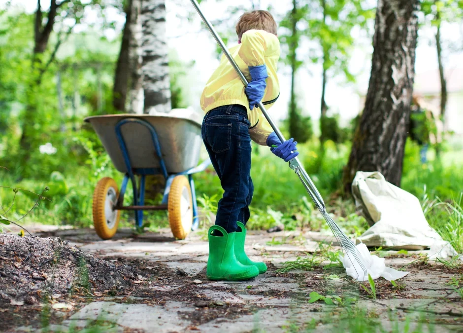 A woman conducting spring yard cleanups in Ontario